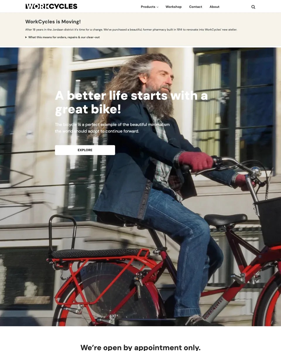 WorkCycles homepage: a rider on a red WorkCycles bike in Amsterdam, with the shop's moving notice above
